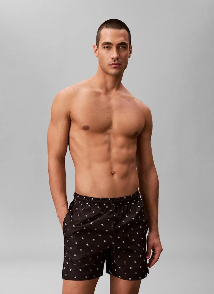 CALVIN KLEIN  Solid Swim Shorts for Men | Best Price UAE